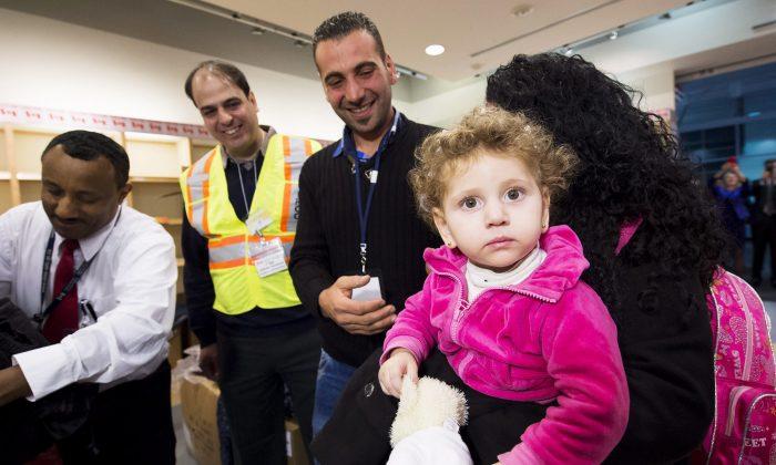 First Government Plane Carrying Refugees Arrives in Canada