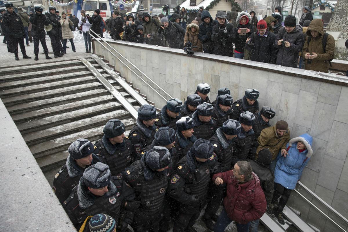 Dozens of Russian Protesters Detained on Constitution Day