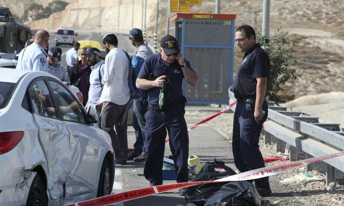 Police: Palestinian Dead After Ramming Israelis, Wounding 9