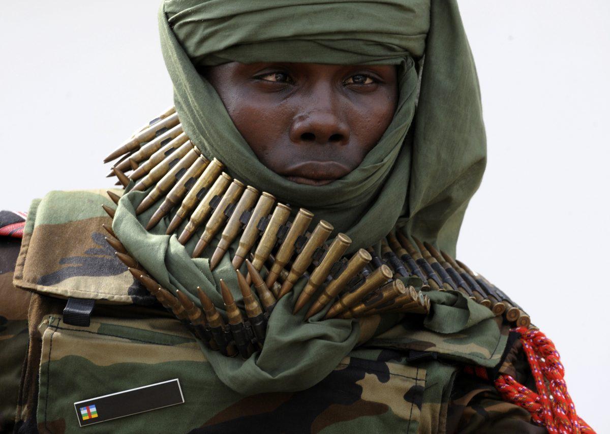 A Seleka rebel carries cartridge belts around his neck in Bangui, the capital of the Central African Republic, on March 29, 2013. (Sia Kambou/AFP/Getty Images)