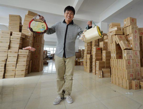 Owner Huang Jianqiao at his handbag factory that sells his goods through the Chinese e-commerce site Taobao in Baigou, Hebei Province, April 24, 2014. (Mark Ralston/AFP/Getty Images)