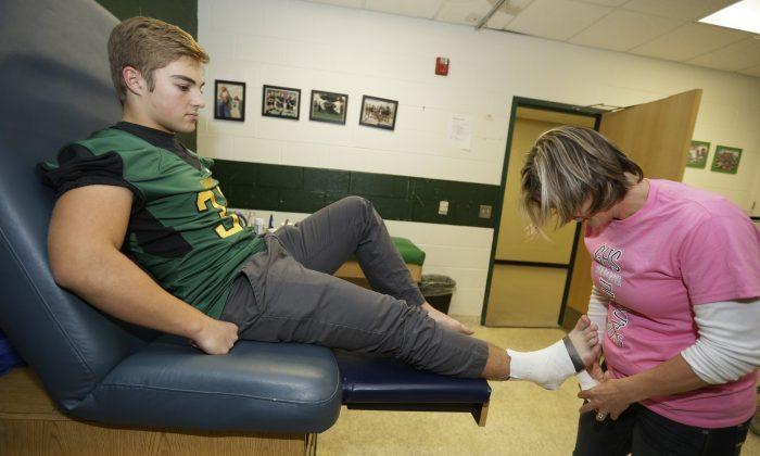 Michigan Schools Try Out Gold Standard of Concussion Tests