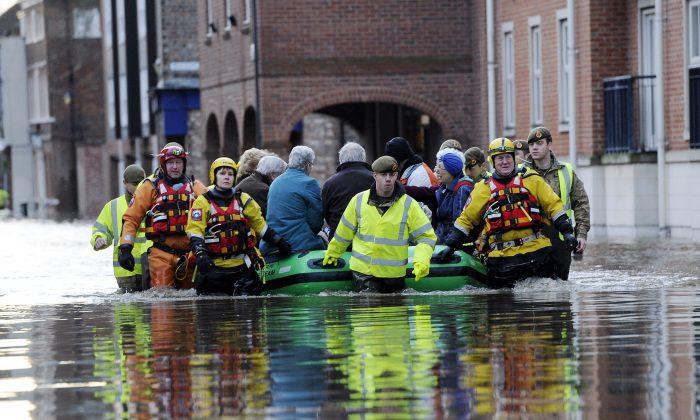 UK Military Helps Combat Flooding as It Spreads to Cities