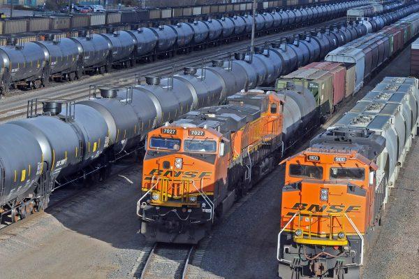 Oil tanker cars sit in the busy Mandan railroad yard in Mandan, N.D., in 2015. (Tom Stromme/The Bismarck Tribune via AP) MANDATORY CREDIT