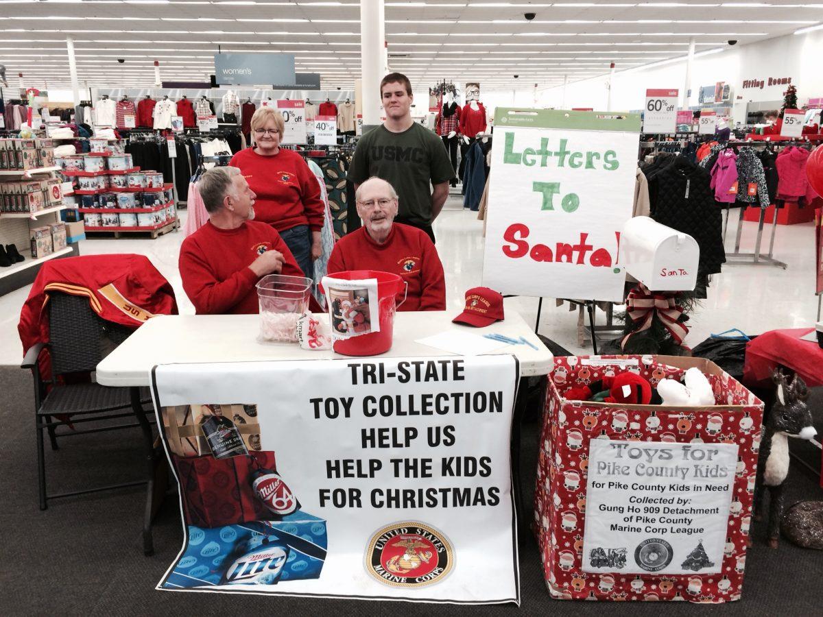 The Gung Ho 909 Detachment of the Pike County Marine Corp League collects toys, letters to Santa, and monetary donations inside a Kmart in Matamoras, Pennsylvania on Dec. 12, 2015. (Holly Kellum/Epoch Times)