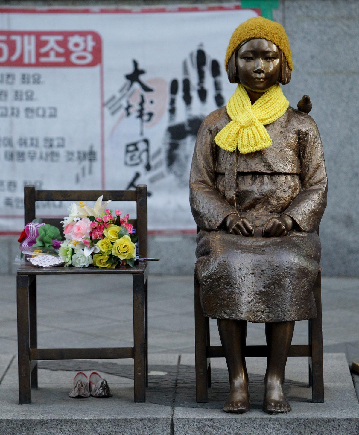 A statue of a girl symbolizing the issue of "comfort women" in front of the Japanese Embassy in Seoul, South Korea, on Dec. 28, 2015. (Chung Sung-jun/Getty Images)