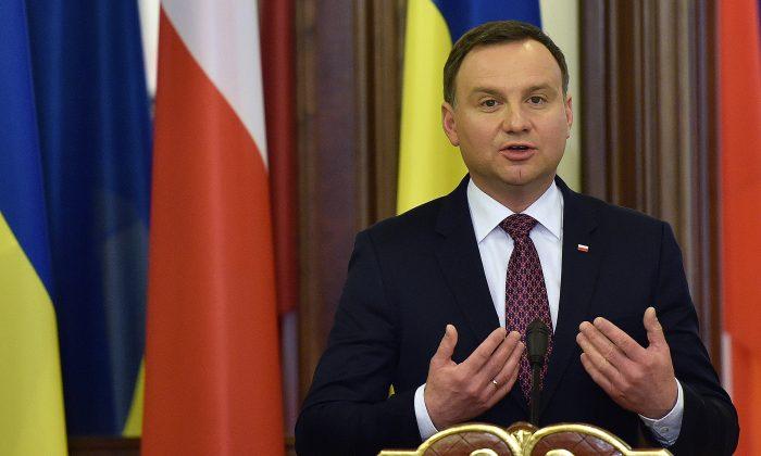 Poland’s President Signs Media Law Despite EU Concerns