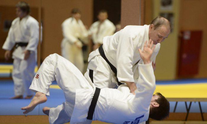 Video: Vladimir Putin Spars With Members of Judo Team