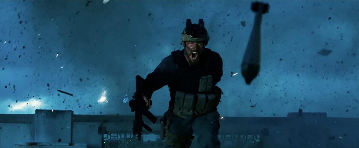 Former Army ranger Kris "Tanto" Paronto (Pablo Schreiber) escapes an explosion in "13 Hours: The Secret Soldiers of Benghazi." (Paramount Pictures/3 Arts Entertainment/Bay Films)