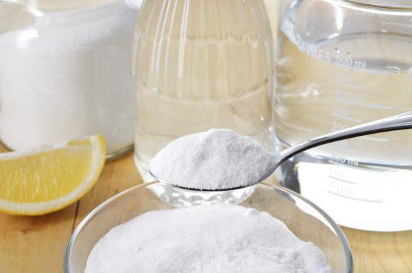 Sprinkle baking soda in pans with burned on food. Add hot water and soak overnight. (Geo-grafika/iStock)