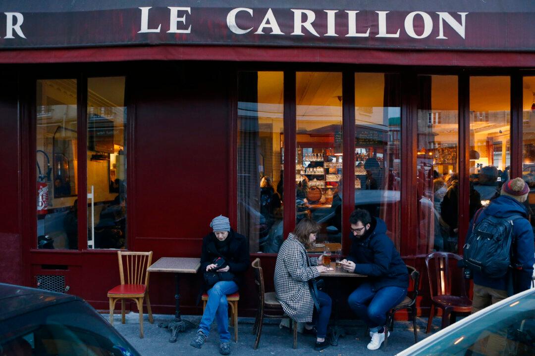 Paris Cafe Reopens After Attacks as Wounded City Revives