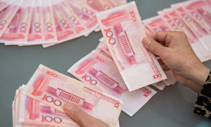 Will China Central Bank’s Debt Bomb Blow Up the Yuan?