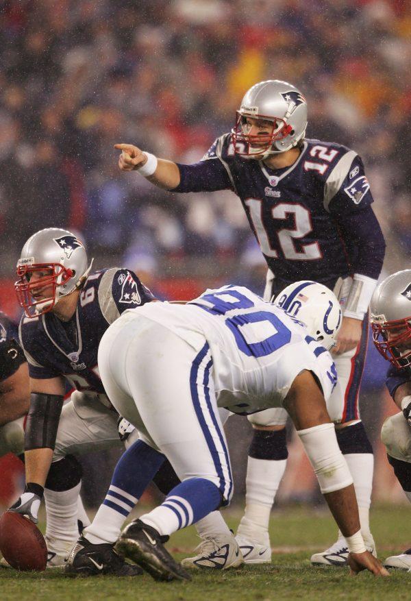 Tom Brady directed his Patriots to postseason wins over Peyton Manning's Indianapolis Colts following the 2003 and 2004 seasons en route to Super Bowl wins both times. (Harry How/Getty Images)