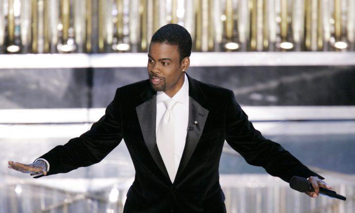 In Oscars Crisis, Chris Rock and a Microphone Loom Large