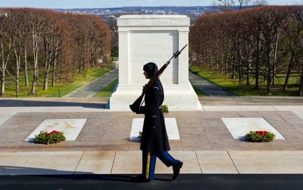 A U.S. Army soldier, from the 3rd Infantry Regiment, walks his tour at the Tomb of the Unknowns at Arlington National Cemetery in Arlington, Va., on Dec. 22, 2012. (Karen Bleier/AFP/Getty Images)