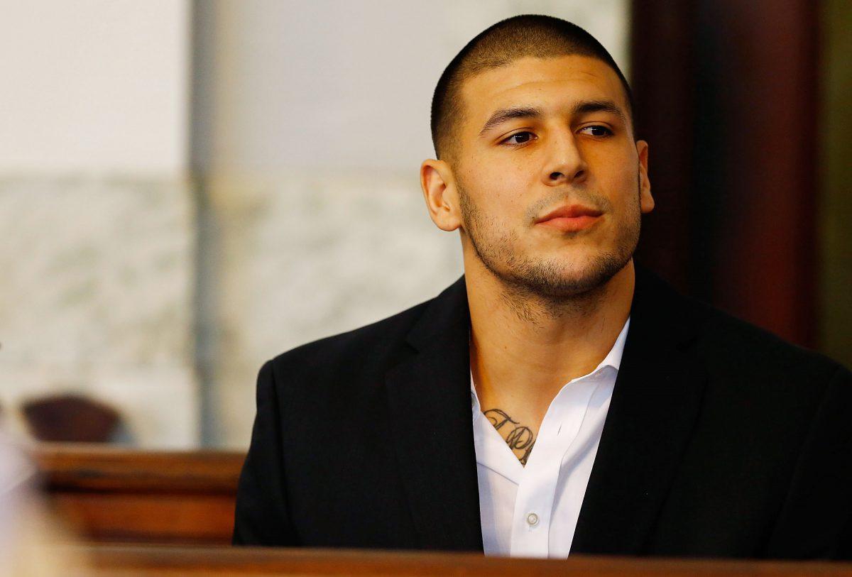 Aaron Hernandez once had a promising career as a young tight end for the New England Patriots before being convicted of first-degree murder. (Jared Wickerham/Getty Images)