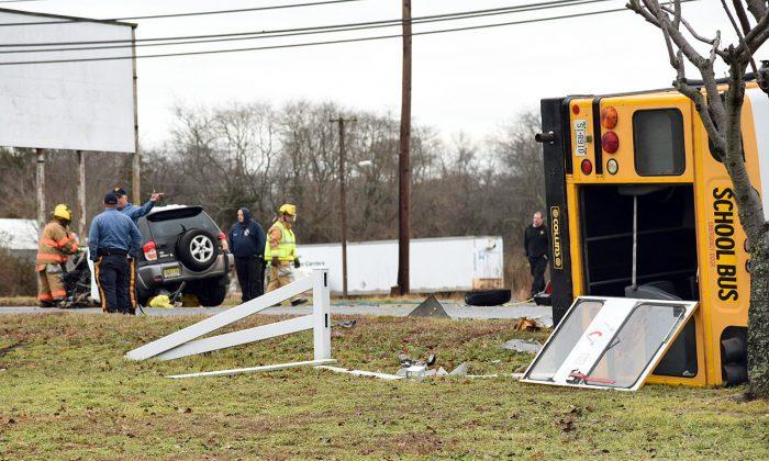 Motorist Dead, 4 Students Hurt in School Bus Crash