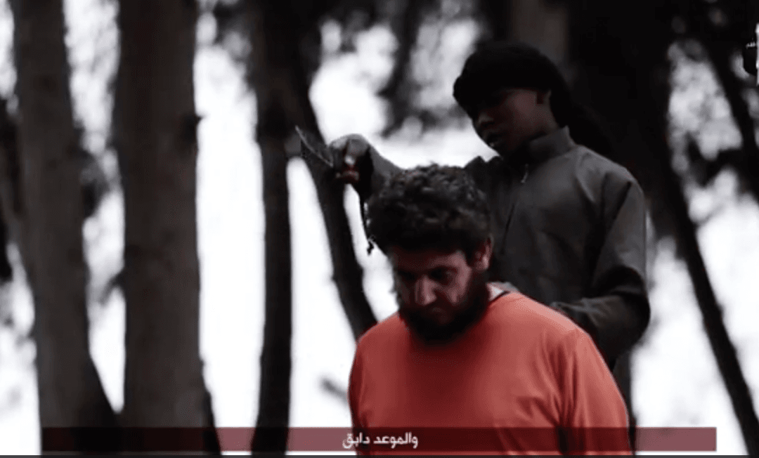 English-Speaking Child Threatens America Before Beheading a Man in New ISIS Video
