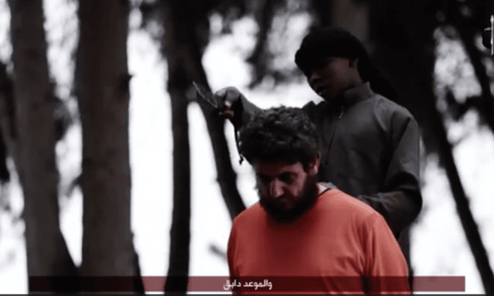 English-Speaking Child Threatens America Before Beheading a Man in New ISIS Video