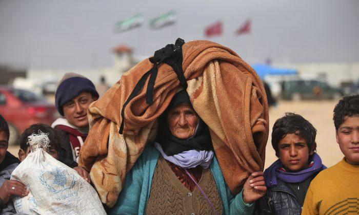 Turkey Under Pressure as Syrians Mass at Border