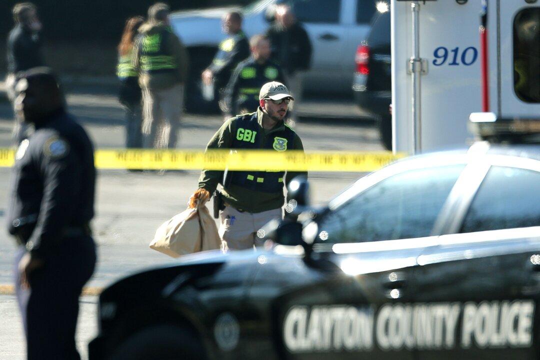 Police Officer Dies After Gun Battle With Suspect Near Atlanta