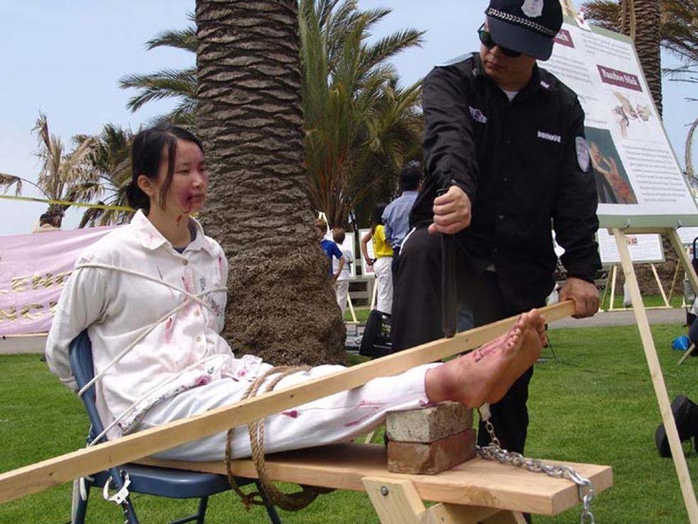 A demonstration of form of torture used on Falun Gong practitioners in China (Minghui)