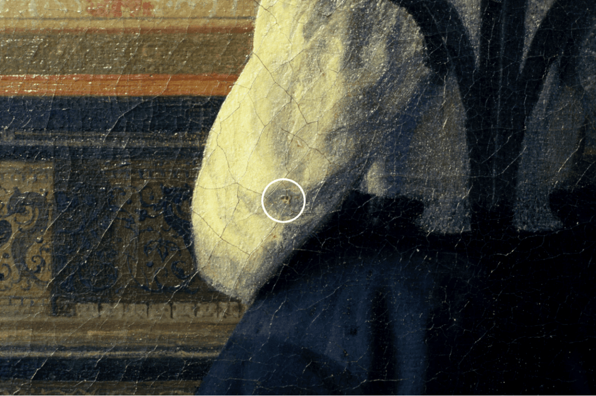  Detail showing the pinhole left in the painting "The Music Lesson" by Johannes Vermeer, circa 1662–1664. (Courtesy of Jorgen Wadum)