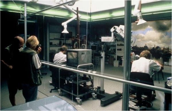 The temporary restoration studio that was open to the public while Jørgen Wadum cleaned "Girl with a Pearl Earring" and his colleague restored "View of Delft" in the Mauritshuis, The Hague in 1994. (Courtesy of Jørgen Wadum)