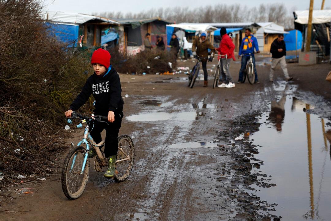 France Programs Slow Death for Calais Migrant Camp