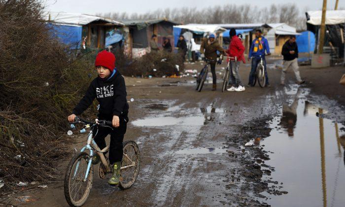France Programs Slow Death for Calais Migrant Camp