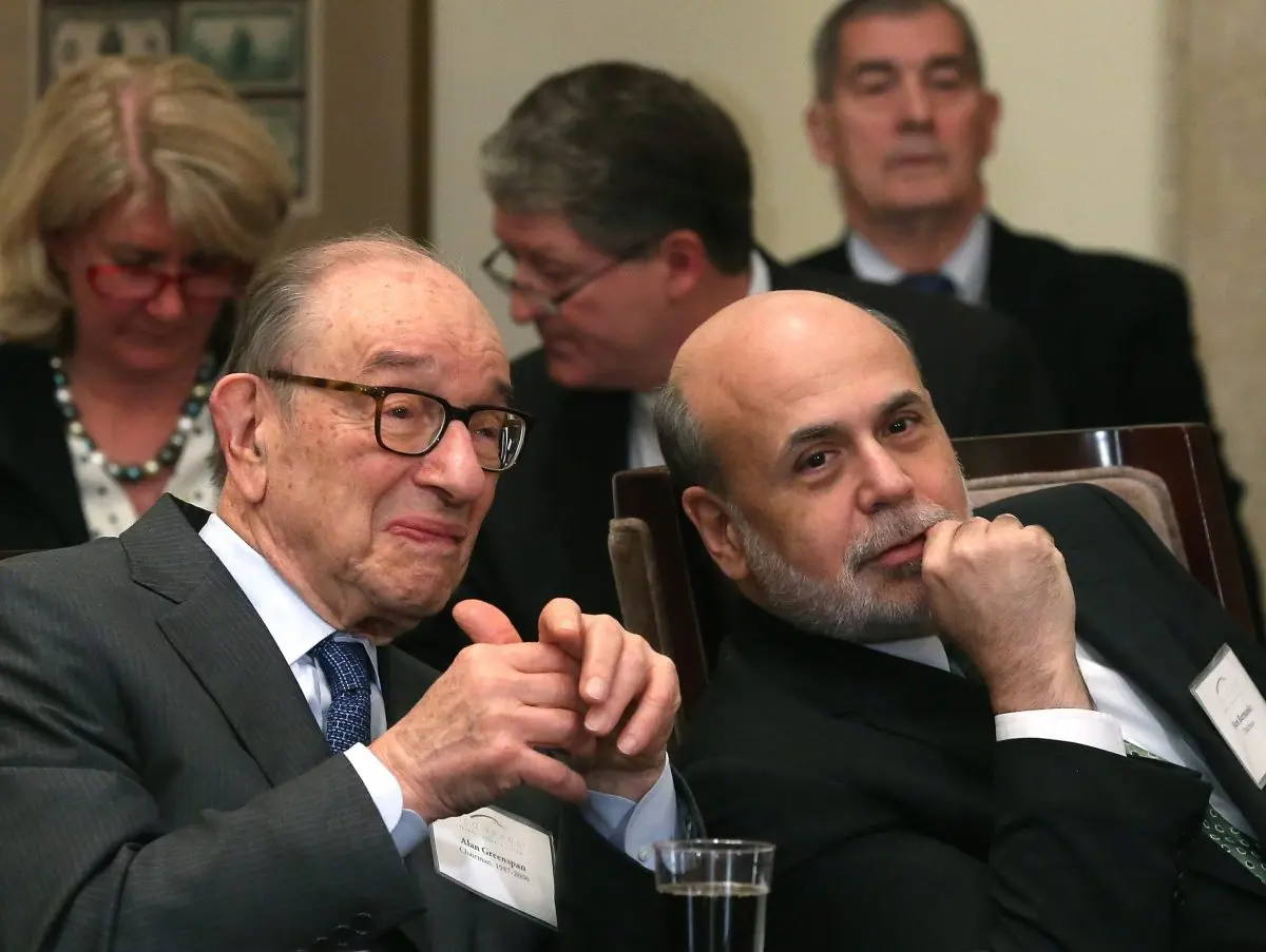 Kevin Warsh Wants an Overhaul of the Fed—Here’s What That Could Look Like | USNN World News Former Federal Reserve Board Chairmen Ben Bernanke (R) and Alan Greenspan at the Federal Reserve building in Washington, on Dec. 16, 2013. (Mark Wilson/Getty Images)