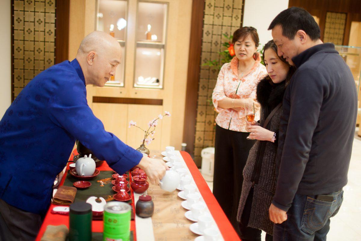 Customers enjoy tea at the unveiling of Qeelin Collections and Chinese New Year Festivities at CH Premier Jewelers in the Westfield Shopping Center in Santa Clara, Calif., on Feb. 20. (Christian Lambert for Epoch Times)