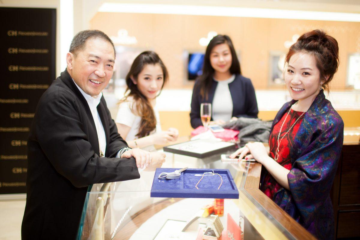 Qeelin co-founder Dennis Chan and CH Premier staff during the unveiling of Qeelin Collections and Chinese New Year Festivities at CH Premier Jewelers in the Westfield Shopping Center in Santa Clara, Calif., on Feb. 20. (Christian Lambert for Epoch Times)