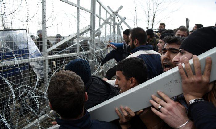 Europe’s Crisis Worsens: Migrants Face Razor Wire, Tear Gas