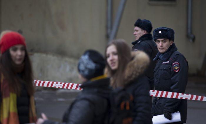 Russian Police Arrest Woman Seen Waving Child’s Head
