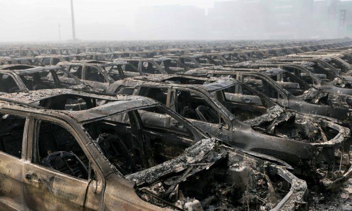 Cars Damaged in Tianjin Explosions Refurbished for Sale