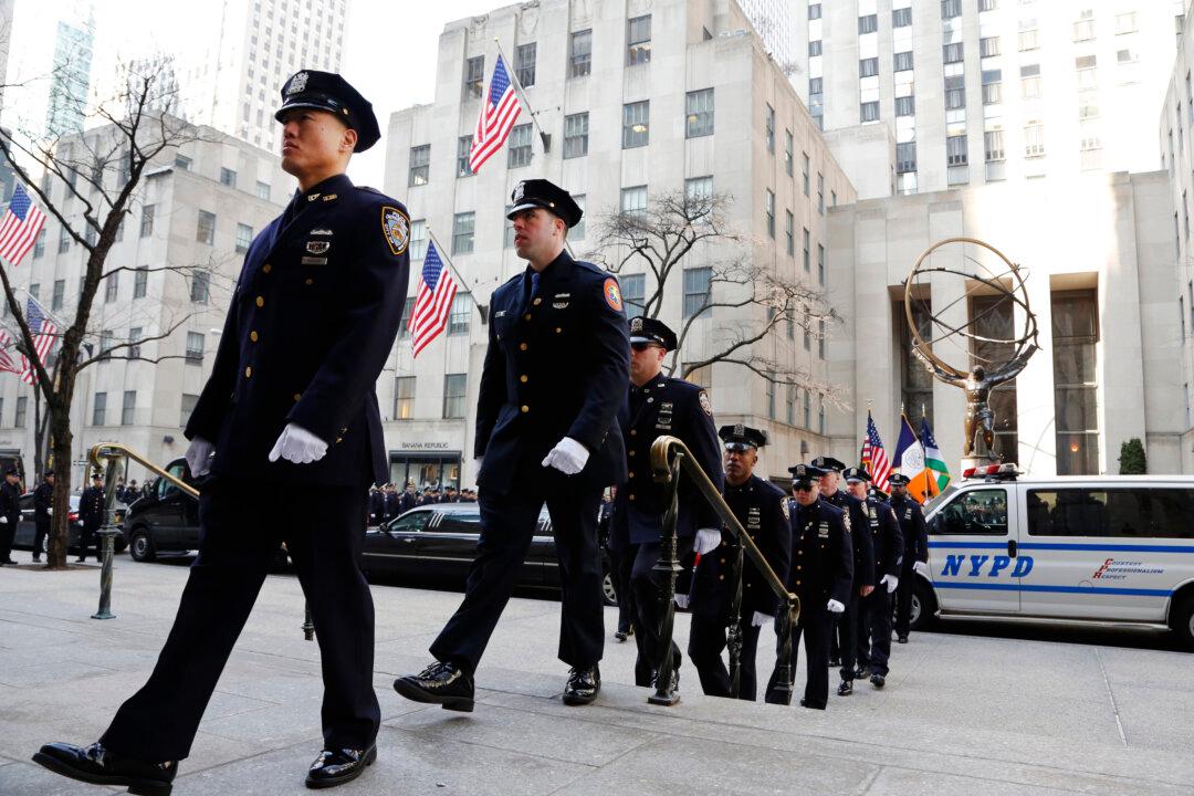 NY Police Officers Honor Former Colleague Killed in Texas