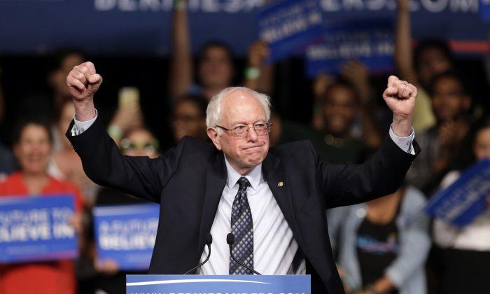 Michigan Triumph Gives Sanders Campaign Hope