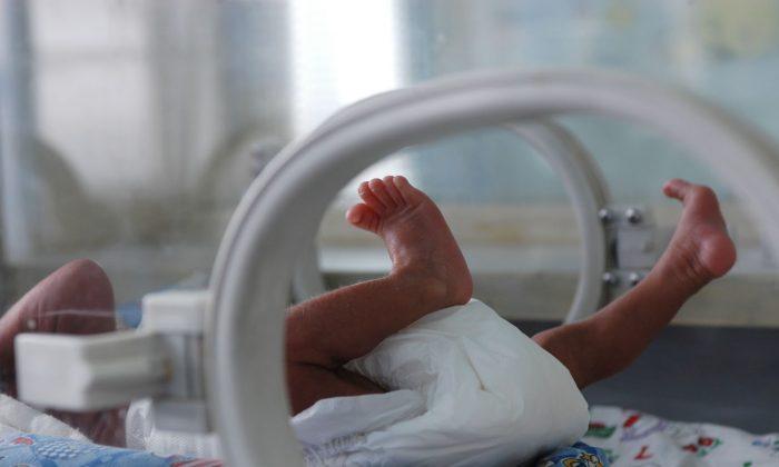 Hoping for a Lucky Birth Hour, Chinese Woman Tries to Delay Delivery of Baby Girl
