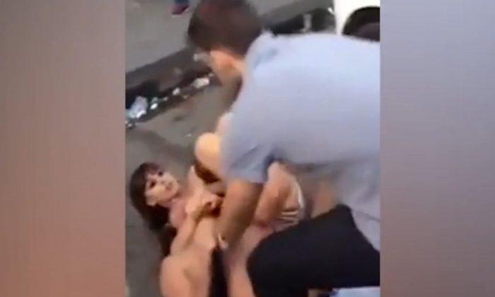Female Jiu-Jitsu Practitioner Grabs Man With Her Legs