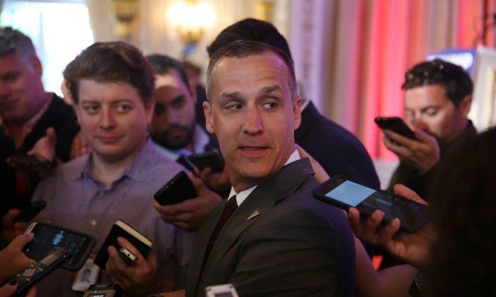 Video: Trump Campaign Manager Grabs Collar of Protester