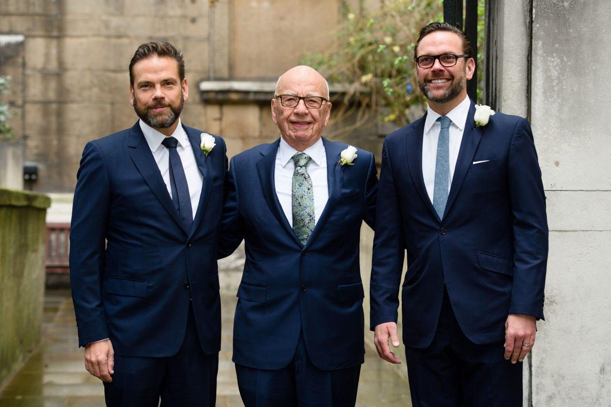 Australian-born media magnate Rupert Murdoch (C) flanked by his sons Lachlan (L) and James (R) arrive at St. Bride's Church on Fleet Street in central London on March 5, 2016, to attend a ceremony of celebration a day after the official marriage of Rupert Murdoch and former U.S. model Jerry Hall. (Leon Neal/AFP/Getty Images)