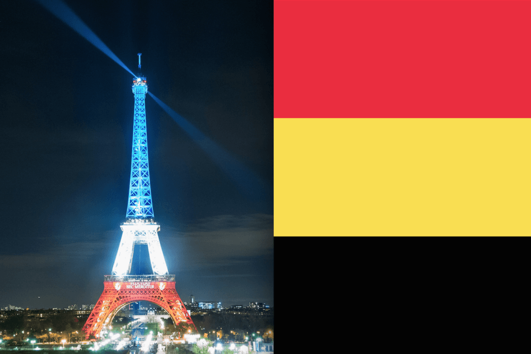 Photos: Eiffel Tower Lit up With Colors of Belgium Flag Following Terrorist Attack