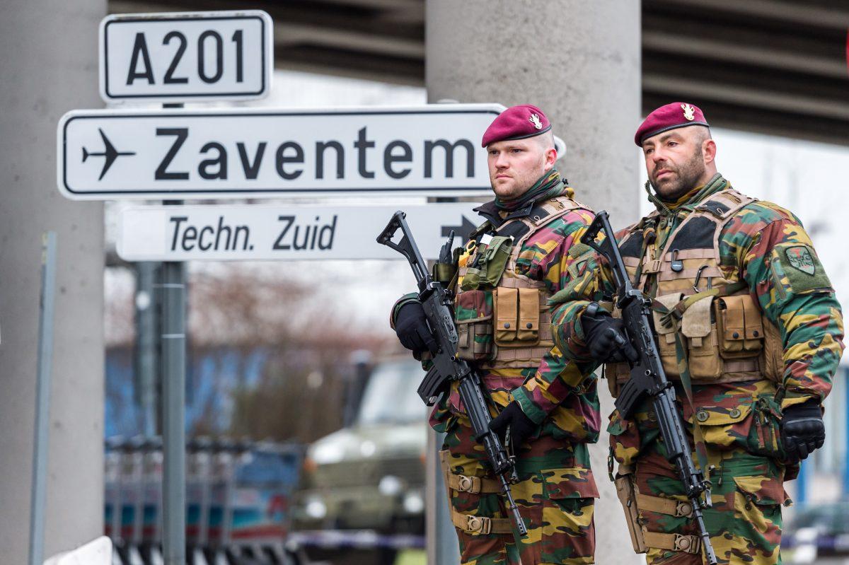 Belgian Army soldiers patrol at Zaventem Airport in Brussels on Mar. 23, 2016. (Geert Vanden Wijngaert/AP Photo)