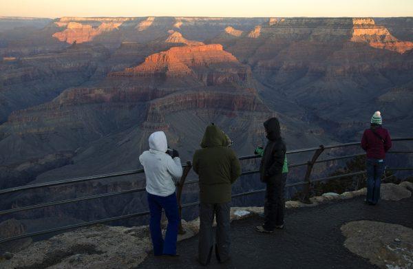 Braving wind and cold to experience sunrise at Grand Canyon on New Year's Day, Jan. 1, 2016. (M. Quinn/National Park Service, CC BY 2.0)