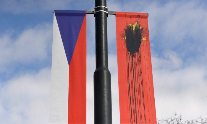 Communist Banners Welcoming Xi Jinping to Czech Republic Defaced by Protesters