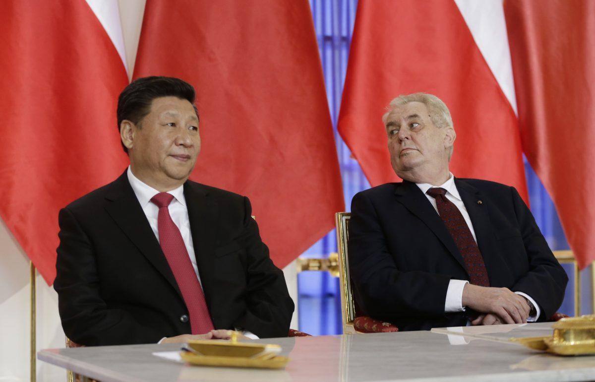 Czech Republic's President Milos Zeman, right, and his Chinese counterpart Xi Jinping, left, wait before signing a bilateral treaty of strategic partnership at the Prague Castle in Prague, Czech Republic, Tuesday, March 29, 2016. (AP Photo/Petr David Josek)