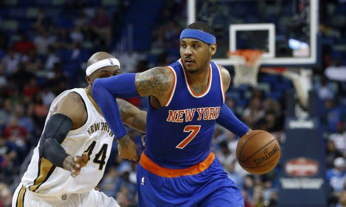 Young Fan Makes Beeline for Carmelo Anthony During Game