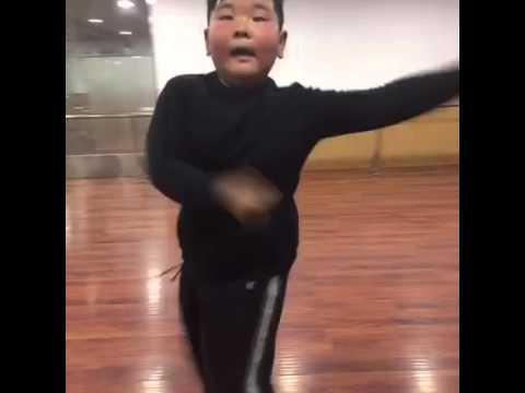 Chinese Boy Shows Off Salsa Moves