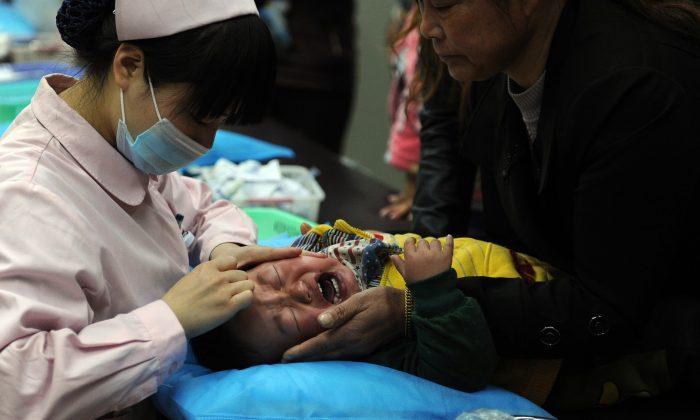 Seeking Safe Vaccines in Hong Kong, Mainland Chinese Face Barriers